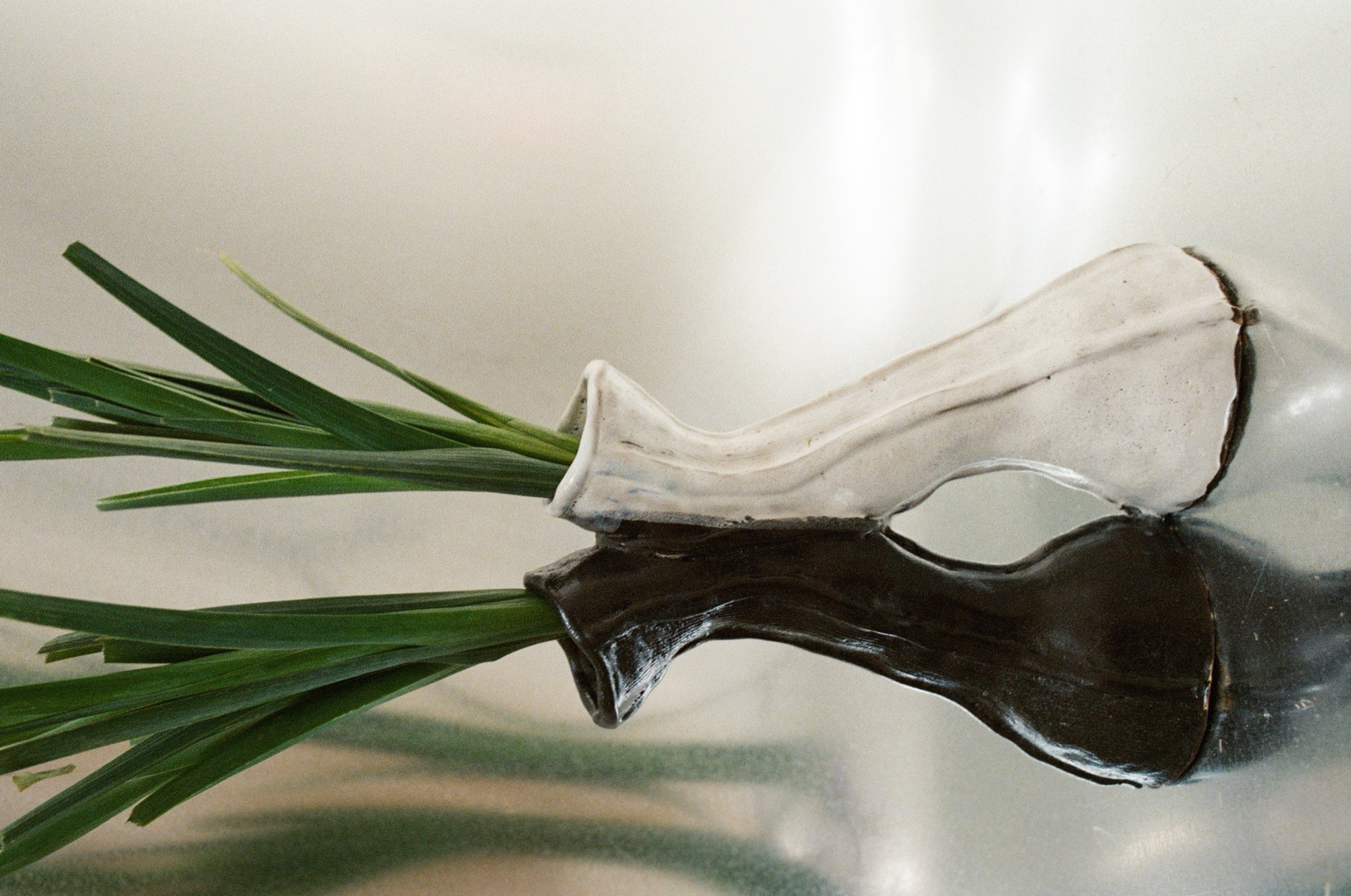 Pair of small glossy bud vases