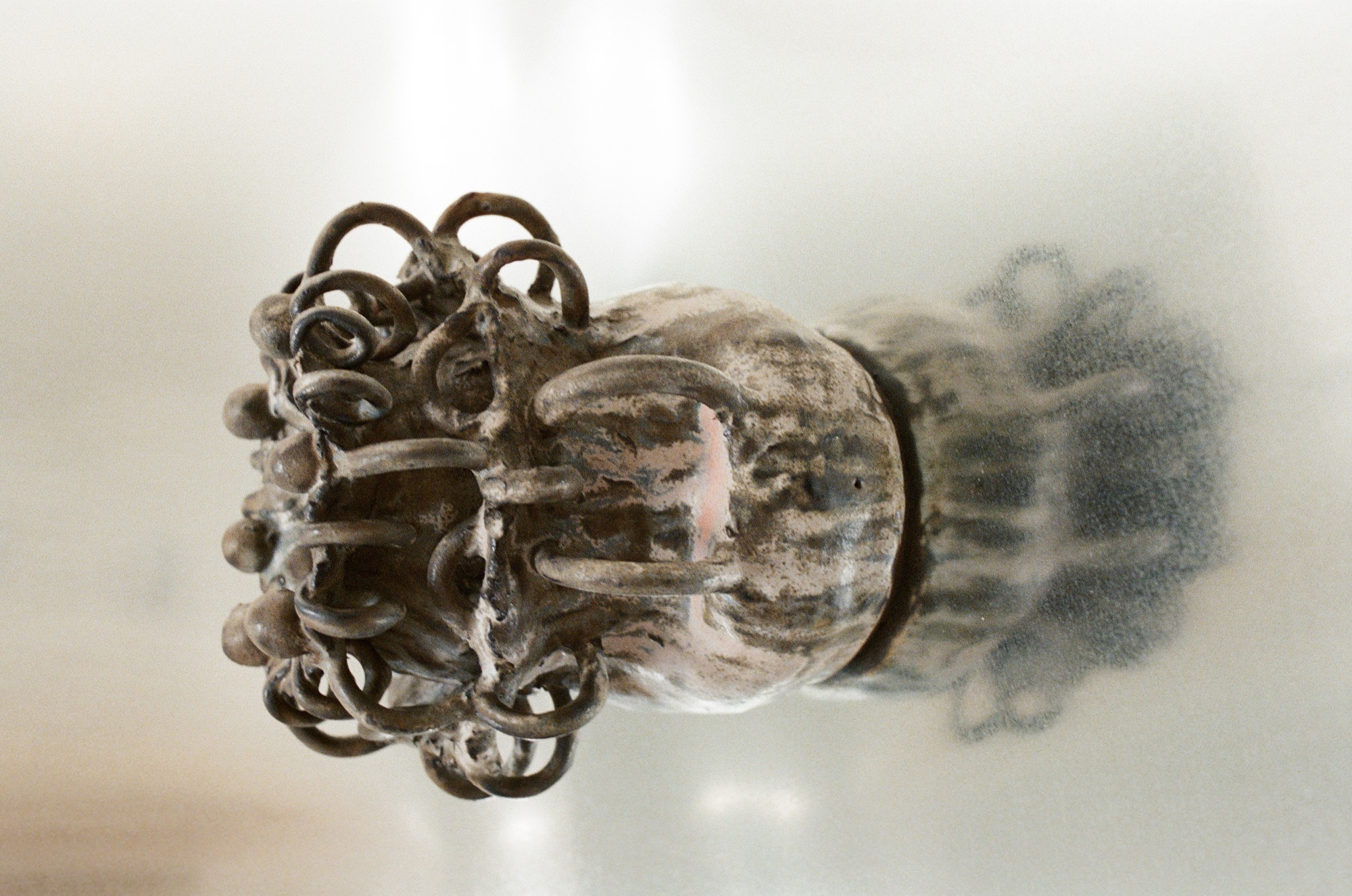 Crown-form ceramic vessel, side view